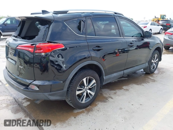 2017 Toyota RAV4 XLE with VIN 2T3WFREV9HW340451, listed as a IAAI auction lot 41937327 with 107,212 mi miles. Bid and sale history available at carsss.com. Image 4.