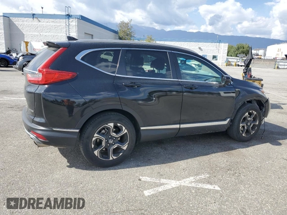2017 Honda CR-V Touring with VIN 2HKRW1H99HH515480, listed as a Copart auction lot 51869635 with 24,393 mi miles and Salvage Title. Bid and sale history available at carsss.com. Image 3.