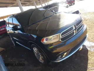 2014 Dodge Durango Limited with VIN 1C4RDHDG9EC306766, listed as a IAAI auction lot 41866574 with 147,746 mi miles. Bid and sale history available at carsss.com. Image 1.