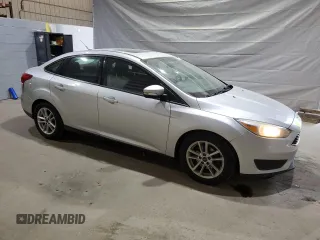 2015 Ford Focus SE with VIN 1FADP3F23FL282798, listed as a Copart auction lot 59588875 with 138,531 mi miles and Salvage title. Bid and sale history available at DreamBid. Image 4.