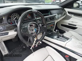 2013 BMW 7 Series 750Li xDrive with VIN WBAYF8C5XDD139832, listed as a IAAI auction lot 42110322 with 149,453 mi miles and . Bid and sale history available at DreamBid. Image 6.