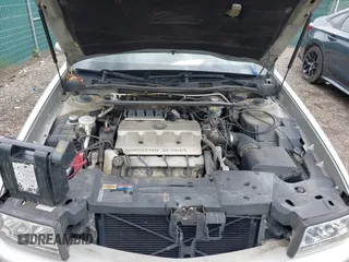 1998 Cadillac DeVille z VIN 1G6KD54Y7WU740871, wystawiony jako IAAI lot #42259686 z przebiegiem 124 542 mil mil oraz . Historia ofert i sprzedaży dostępna na DreamBid. Obrazek 10.