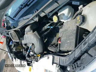 2016 Ford Transit Cargo z VIN 1FTYR1CM1GKB39890, wystawiony jako IAAI lot #42594883 z przebiegiem 123 312 mil mil oraz . Historia ofert i sprzedaży dostępna na DreamBid. Obrazek 18.