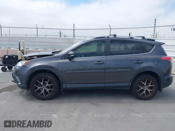 2017 Toyota RAV4 SE with VIN JTMJFREV5HJ155712, listed as a IAAI auction lot 42613998 with 72,112 mi miles and . Bid and sale history available at DreamBid. Image 14.