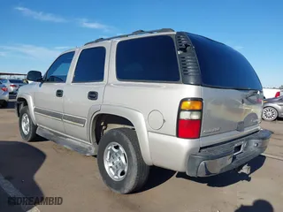 2005 Chevrolet Tahoe LS with VIN 1GNEK13T95J124661, listed as a IAAI auction lot 41885297 with 309,905 mi miles. Bid and sale history available at carsss.com. Image 3.