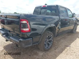 2023 Ram 1500 Limited with VIN 1C6SRFHT6PN541655, listed as a IAAI auction lot 42143725 with 52,793 mi miles and . Bid and sale history available at DreamBid. Image 4.