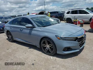 2021 Honda Accord Touring with VIN 1HGCV2F94MA005641, listed as a IAAI auction lot 42356525 with 43,885 mi miles and . Bid and sale history available at DreamBid. Image 1.