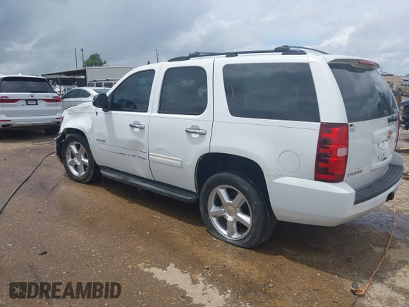 2013 Chevrolet Tahoe LS with VIN 1GNSCAE01DR260799, listed as a IAAI auction lot 42496680 with 199,276 mi miles and . Bid and sale history available at DreamBid. Image 3.