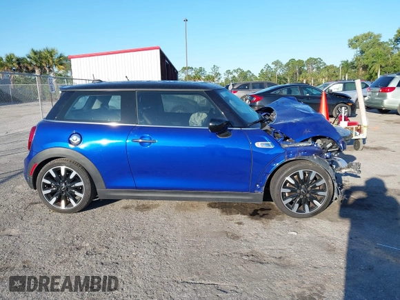 2020 MINI Hardtop Cooper S z VIN WMWXR5C09L2M32640, wystawiony jako IAAI lot #41463311 z przebiegiem 62 050 mil mil oraz . Historia ofert i sprzedaży dostępna na DreamBid. Obrazek 12.