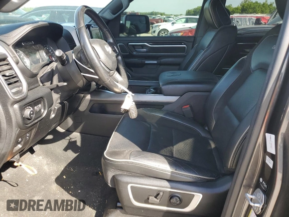 2021 Ram 1500 Laramie with VIN 1C6SRFJT3MN677537, listed as a Copart auction lot 57936295 with Not provided miles and Salvage title. Bid and sale history available at DreamBid. Image 7.