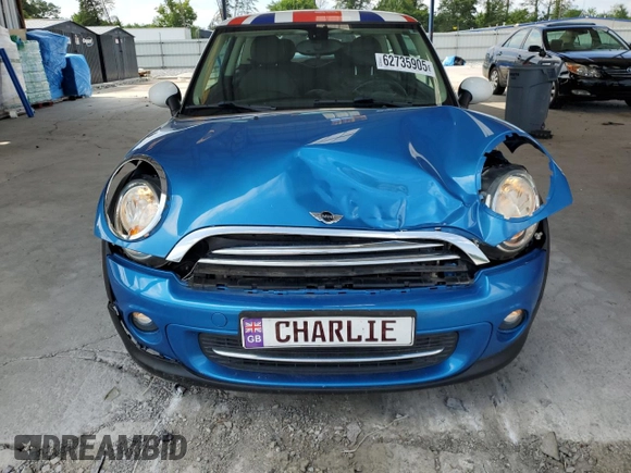 2011 MINI Hardtop with VIN WMWSU3C52BT252207, listed as a Copart auction lot 62735905 with 121,121 mi miles and Salvage title. Bid and sale history available at DreamBid. Image 5.
