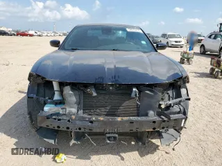 2015 Dodge Charger SXT with VIN 2C3CDXHG7FH721825, listed as a Copart auction lot 58076255 with 193,740 mi miles and Salvage title. Bid and sale history available at DreamBid. Image 5.