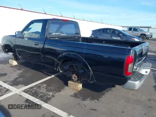 2001 Nissan Frontier XE z VIN 1N6DD21S41C399865, wystawiony jako IAAI lot #41569843 z przebiegiem Nie podano mil oraz . Historia ofert i sprzedaży dostępna na DreamBid. Obrazek 3.