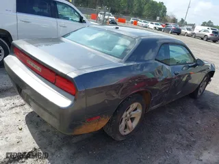 2013 Dodge Challenger SXT with VIN 2C3CDYAGXDH511832, listed as a IAAI auction lot 41542016 with 125,216 mi miles. Bid and sale history available at carsss.com. Image 4.