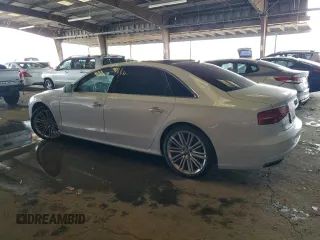 2017 Audi A8 with VIN WAU44AFD2HN009512, listed as a Copart auction lot 84442474 with 44,174 mi miles and Salvage title. Bid and sale history available at DreamBid. Image 2.