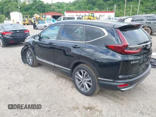 2021 Honda CR-V Touring with VIN 5J6RW2H92ML003064, listed as a IAAI auction lot 42298361 with 70,988 mi miles and . Bid and sale history available at DreamBid. Image 3.