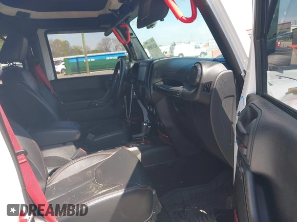 2017 Jeep Wrangler Unlimited Rubicon with VIN 1C4BJWFG9HL695361, listed as a IAAI auction lot 42010655 with 65,536 mi miles and . Bid and sale history available at DreamBid. Image 5.