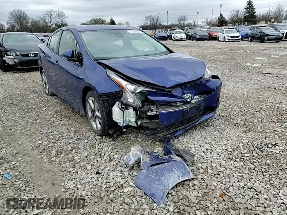 2017 Toyota Prius Two z VIN JTDKARFU8H3532336, wystawiony jako Copart lot #51109475 z przebiegiem Nie podano mil oraz Szkoda całkowita • Salvage title. Historia ofert i sprzedaży dostępna na DreamBid. Obrazek 11.