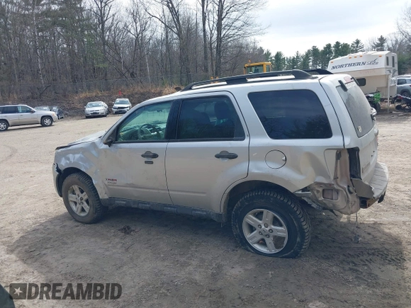 2010 Ford Escape Hybrid z VIN 1FMCU5K33AKC89835, wystawiony jako IAAI lot #41915349 z przebiegiem 125 659 mil mil oraz . Historia ofert i sprzedaży dostępna na DreamBid. Obrazek 14.