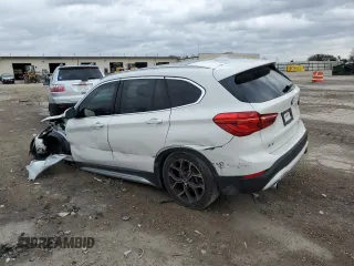 2022 BMW X1 xDrive28i with VIN WBXJG9C0XN5U63096, listed as a Copart auction lot 79253954 with 17,311 mi miles and Salvage Title. Bid and sale history available at carsss.com. Image 2.