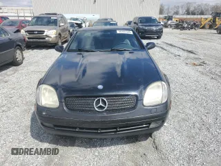 1999 Mercedes-Benz SLK-Class with VIN WDBKK47F2XF102927, listed as a Copart auction lot 50265585 with 184,918 mi miles and Salvage Title. Bid and sale history available at carsss.com. Image 5.