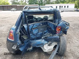 2009 MINI Hardtop with VIN WMWMF33509TU74290, listed as a IAAI auction lot 42538919 with 104,209 mi miles and . Bid and sale history available at DreamBid. Image 16.