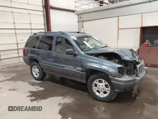 2001 Jeep Grand Cherokee Laredo z VIN 1J4GW48N11C646758, wystawiony jako IAAI lot #42182082 z przebiegiem Nie podano mil oraz . Historia ofert i sprzedaży dostępna na DreamBid. Obrazek 1.