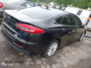 2020 Ford Fusion SE z VIN 3FA6P0HD5LR178607, wystawiony jako IAAI lot #42094774 z przebiegiem 123 341 mil mil oraz . Historia ofert i sprzedaży dostępna na DreamBid. Obrazek 4.
