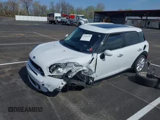 2016 MINI Countryman S with VIN WMWZC3C51GWT10458, listed as a IAAI auction lot 41878799 with 112,019 mi miles and . Bid and sale history available at DreamBid. Image 17.