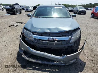 2012 Ford Fusion SEL z VIN 3FAHP0JA1CR182047, wystawiony jako Copart lot #56521525 z przebiegiem 200 523 mil mil oraz Szkoda całkowita • Salvage title. Historia ofert i sprzedaży dostępna na DreamBid. Obrazek 5.