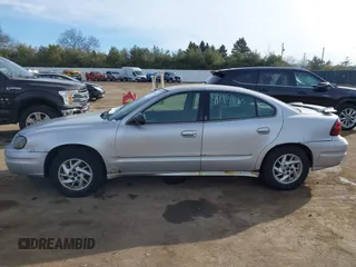 2004 Pontiac Grand Am SE1 with VIN 1G2NF52E24C239133, listed as a IAAI auction lot 41458613 with 149,815 mi miles and . Bid and sale history available at DreamBid. Image 14.