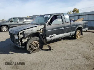1993 Nissan Hardbody with VIN 1N6HD16SXPC310961, listed as a Copart auction lot 79261954 with 329,438 mi miles and Salvage Title. Bid and sale history available at DreamBid. Image 1.