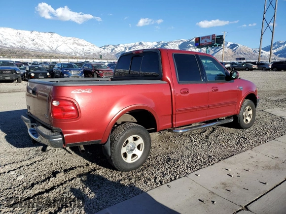 2002 Ford F-150 XLT with VIN 1FTRW08L02KB81578, listed as a Copart auction lot 47069215 with 201,148 mi miles and Salvage Title. Bid and sale history available at carsss.com. Image 3.