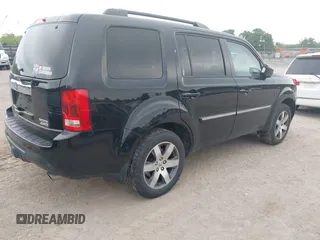 2015 Honda Pilot Touring with VIN 5FNYF4H9XFB036493, listed as a IAAI auction lot 42190624 with 223,675 mi miles and . Bid and sale history available at DreamBid. Image 4.