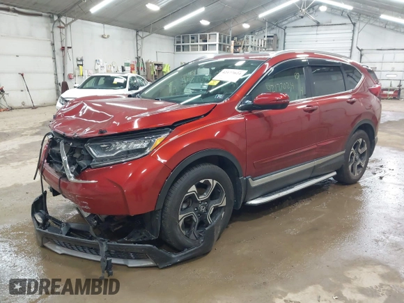 2017 Honda CR-V Touring with VIN 2HKRW2H95HH610401, listed as a IAAI auction lot 42177024 with 42,494 mi miles and . Bid and sale history available at carsss.com. Image 17.