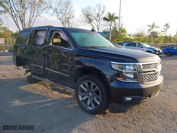2018 Chevrolet Tahoe LT with VIN 1GNSCBKC1JR365875, listed as a IAAI auction lot 41584072 with 61,957 mi miles. Bid and sale history available at carsss.com. Image 1.