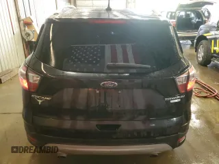 2018 Ford Escape Titanium with VIN 1FMCU9J9XJUA01357, listed as a Copart auction lot 56868735 with 67,315 mi miles and Salvage title. Bid and sale history available at DreamBid. Image 6.