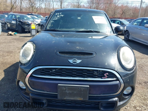 2017 MINI Hardtop 4 Door Cooper S z VIN WMWXU3C39H2F48699, wystawiony jako IAAI lot #41924423 z przebiegiem 81 249 mil mil oraz . Historia ofert i sprzedaży dostępna na DreamBid. Obrazek 12.
