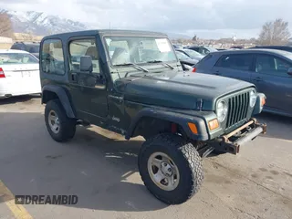 1998 Jeep Wrangler SE with VIN 1J4FY29P1WP760687, listed as a IAAI auction lot 41720889 with 210,592 mi miles. Bid and sale history available at carsss.com. Image 1.