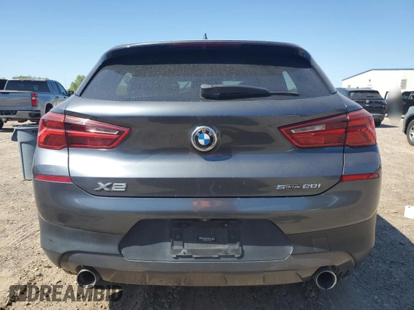 2020 BMW X2 sDrive28i z VIN WBXYH9C07L5P73232, wystawiony jako Copart lot #51948905 z przebiegiem Nie podano mil oraz Szkoda całkowita • Salvage title. Historia ofert i sprzedaży dostępna na DreamBid. Obrazek 6.