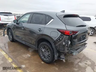 2021 Mazda CX-5 Touring with VIN JM3KFBCM0M0342210, listed as a IAAI auction lot 41236013 with 96,012 mi miles. Bid and sale history available at carsss.com. Image 3.