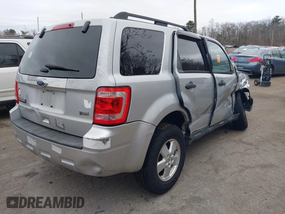 2012 Ford Escape XLT z VIN 1FMCU9DG4CKC57695, wystawiony jako IAAI lot #41716974 z przebiegiem 143 860 mil mil oraz . Historia ofert i sprzedaży dostępna na DreamBid. Obrazek 4.