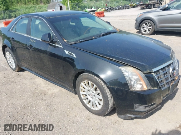 2012 Cadillac CTS Luxury z VIN 1G6DG5E58C0134874, wystawiony jako IAAI lot #42564120 z przebiegiem 121 053 mil mil oraz . Historia ofert i sprzedaży dostępna na DreamBid. Obrazek 1.