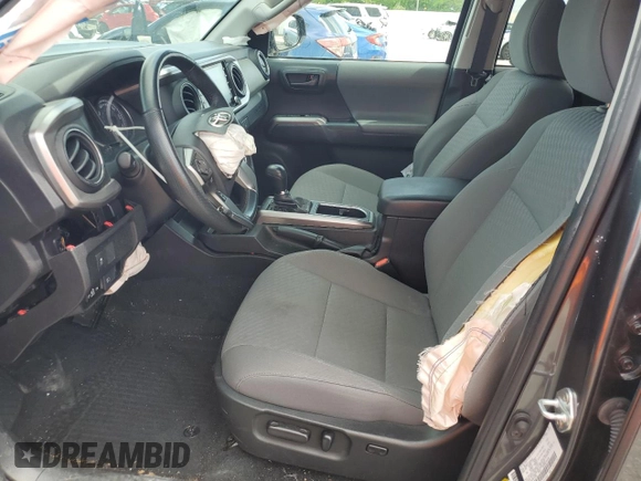 2023 Toyota Tacoma SR with VIN 3TMCZ5AN6PM571686, listed as a Copart auction lot 60260095 with 29,687 mi miles and Non repairable. Bid and sale history available at DreamBid. Image 7.