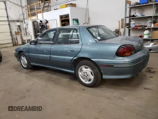 1997 Pontiac Grand Am SE with VIN 1G2NE52M8VC721326, listed as a Copart auction lot 75860034 with 110,209 mi miles and Salvage Title. Bid and sale history available at carsss.com. Image 2.
