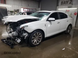2016 Lincoln MKS z VIN 1LNHL9DK0GG601318, wystawiony jako Copart lot #80114224 z przebiegiem 67 526 mil mil oraz Szkoda całkowita • Salvage title. Historia ofert i sprzedaży dostępna na DreamBid. Obrazek 1.