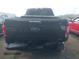 2015 Ford F-150 XLT w/HD Payload Pkg with VIN 1FTFW1EF9FFA14450, listed as a IAAI auction lot 41867454 with 146,157 mi miles. Bid and sale history available at carsss.com. Image 16.