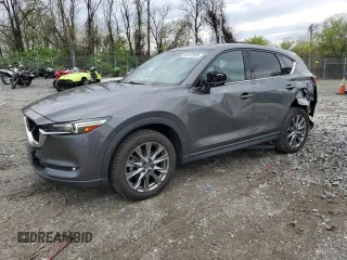 2019 Mazda CX-5 Signature with VIN JM3KFBEY3K0521581, listed as a Copart auction lot 53112925 with 62,977 mi miles and Salvage Title. Bid and sale history available at carsss.com. Image 1.