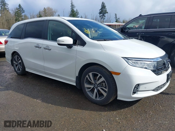 2021 Honda Odyssey Touring with VIN 5FNRL6H87MB015310, listed as a IAAI auction lot 41916339 with 58,808 mi miles. Bid and sale history available at carsss.com. Image 1.