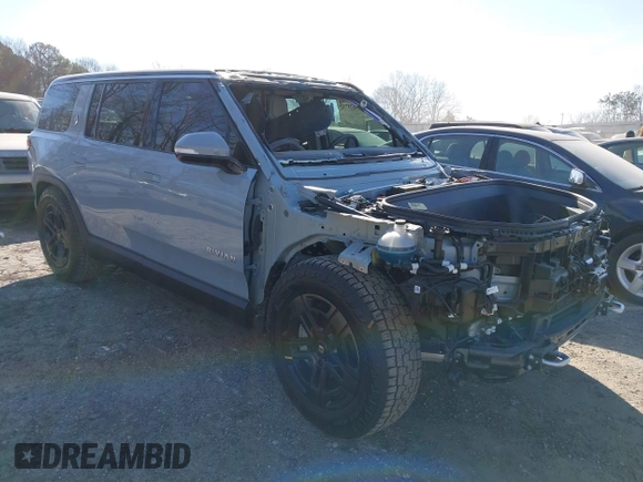 2024 Rivian R1S Adventure with VIN 7PDSGBBA8RN043516, listed as a IAAI auction lot 41675732 with 1 mi miles. Bid and sale history available at carsss.com. Image 1.